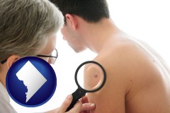 washington-dc map icon and a dermatologist examines a mole on a male patient