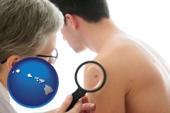 hi map icon and a dermatologist examines a mole on a male patient