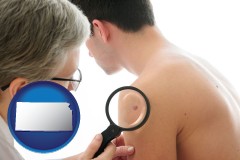 kansas map icon and a dermatologist examines a mole on a male patient