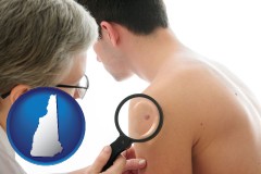 new-hampshire map icon and a dermatologist examines a mole on a male patient
