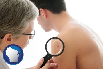 a dermatologist examines a mole on a male patient - with Wisconsin icon